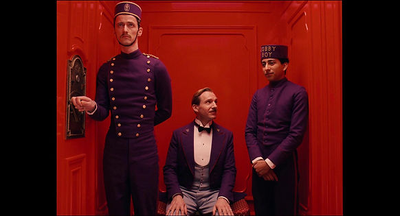 Ralph Fiennes, Tony Revolori, and Paul Schlase in The Grand Budapest Hotel (2014)